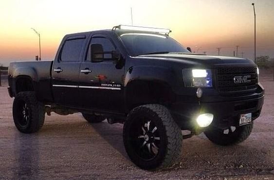 Black customized pickup photographed for the Chandler vehicle-protection operation
